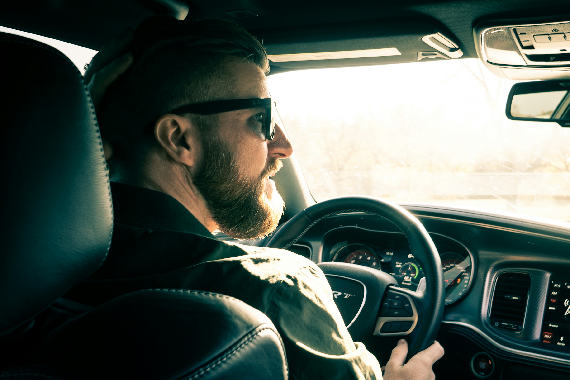 A man sitting in a car | Source: Unsplash